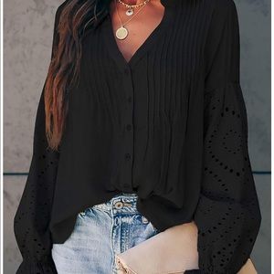 Black blouse with big lace sleeves